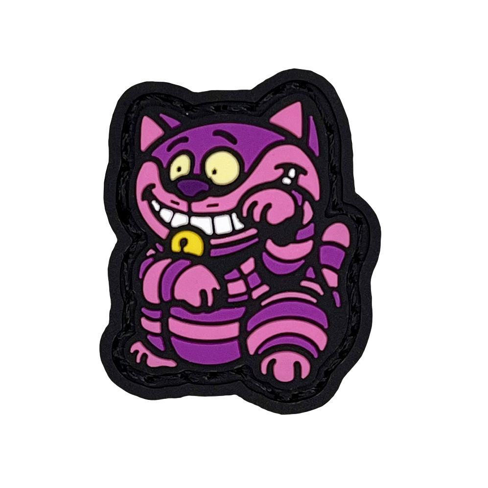 Cheshire Cat striking a 'lucky cat' (neko) pose for good fortune.