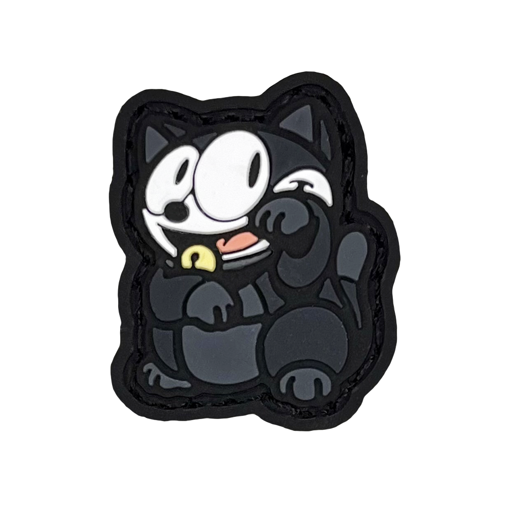 Felix the Cat striking a 'lucky cat' (neko) pose for good fortune.