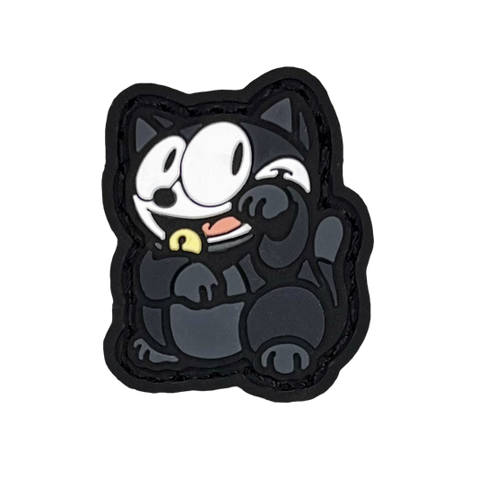 Felix the Cat striking a 'lucky cat' (neko) pose for good fortune.